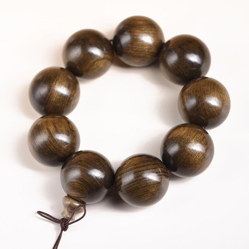 Sichuan Golden Silk Nanmu Ebony Bracelet - Intricate Wenwan Ornament with Perfect Style