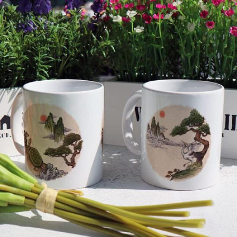 dc424-Design Mug 2p-Ten Longevity Symbols