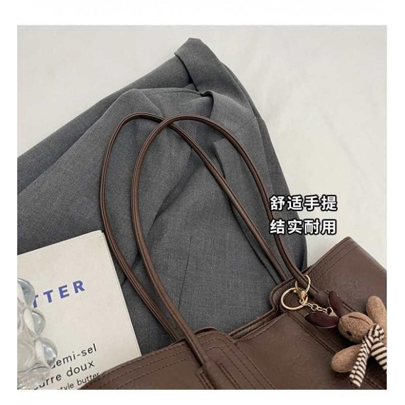 Hochwertige Retro-Tasche mit großem Fassungsvermögen, modische Damen-Umhängetasche für Pendler, beliebte Tragetasche