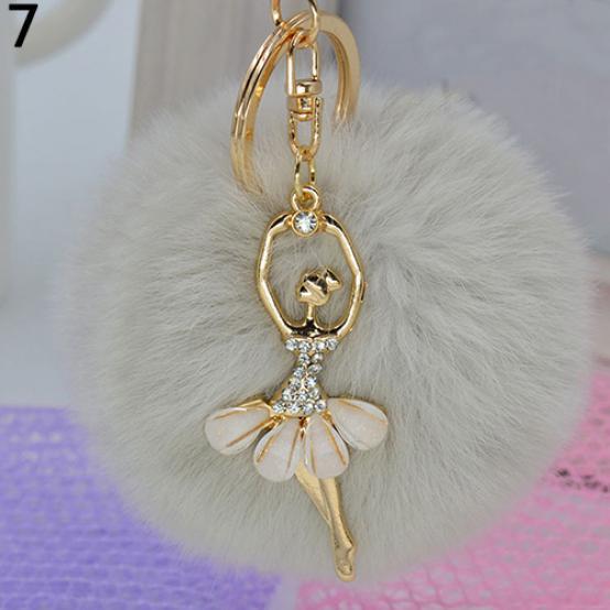 

Брелок на сумочку серый