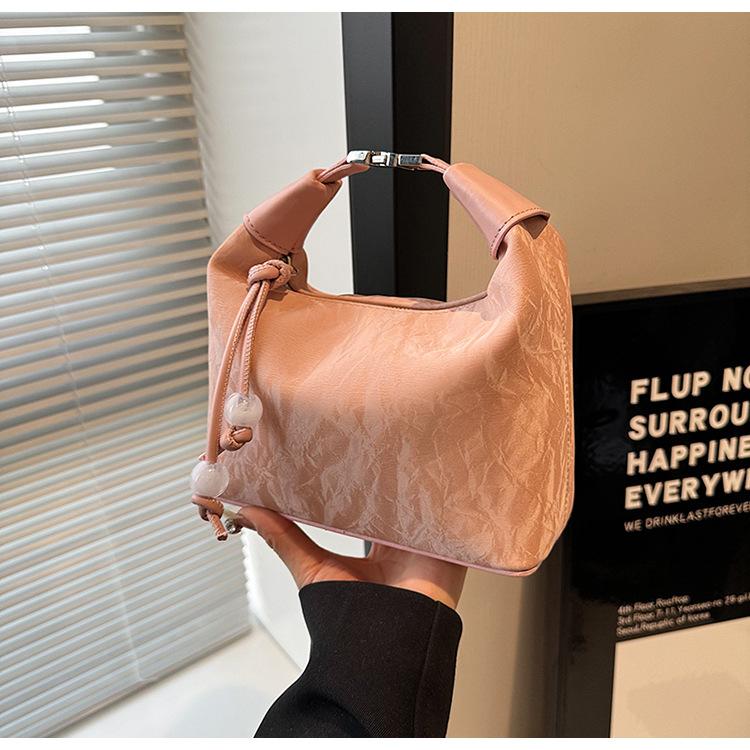 

Ручная сумка-пельмень женская летняя новая нишевая дизайнерская сумка через плечо, сумка-мессенджер, маленькая сумка высокого класса розовый