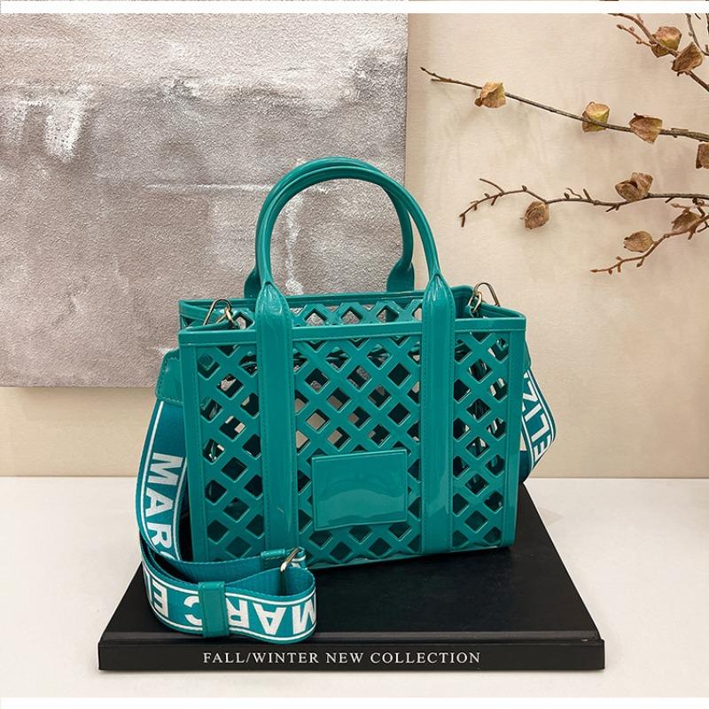 Mode Bonbonfarbe Strandtasche Damen neue personalisierte hohle Handtasche Nische Schultertasche Umhängetasche