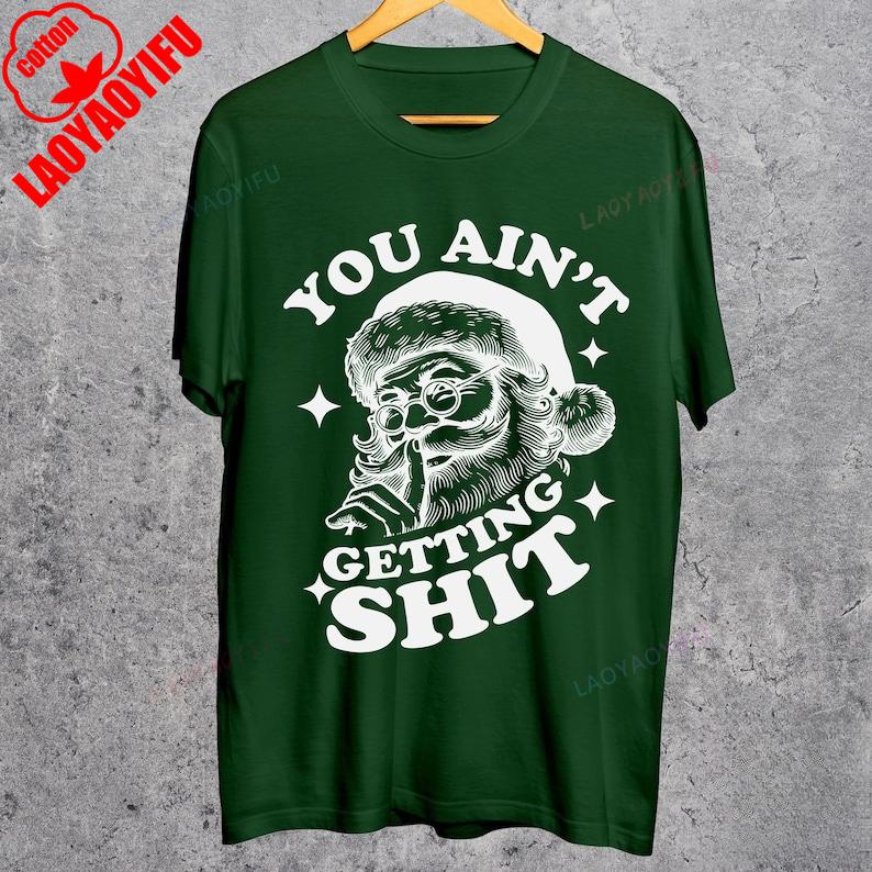 

Funny Getting Santa Claus Christmas High Quality Cotton Print Shortsleev Loose Casual Lovely Novelty Fashion Adult Unisex Tees 4XL
