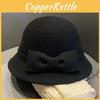 French Chic Style Round Top Hat With Windproof Design For Autumn And Winter Wear