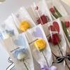 20 Stück Herzförmige Einzelblumen-Verpackungsbeutel Romantische Opp-Beutel Blumenstrauß-Verpackungsbeutel Wasserdichte Blumengeschenktüten Raumdekoration