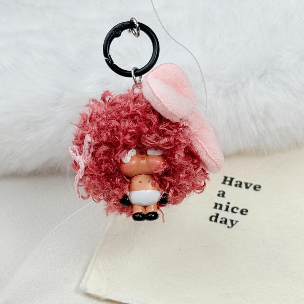 Crying Doll Keychain with Wig & Bow - Creative Cartoon Pendant for Bags & Phones