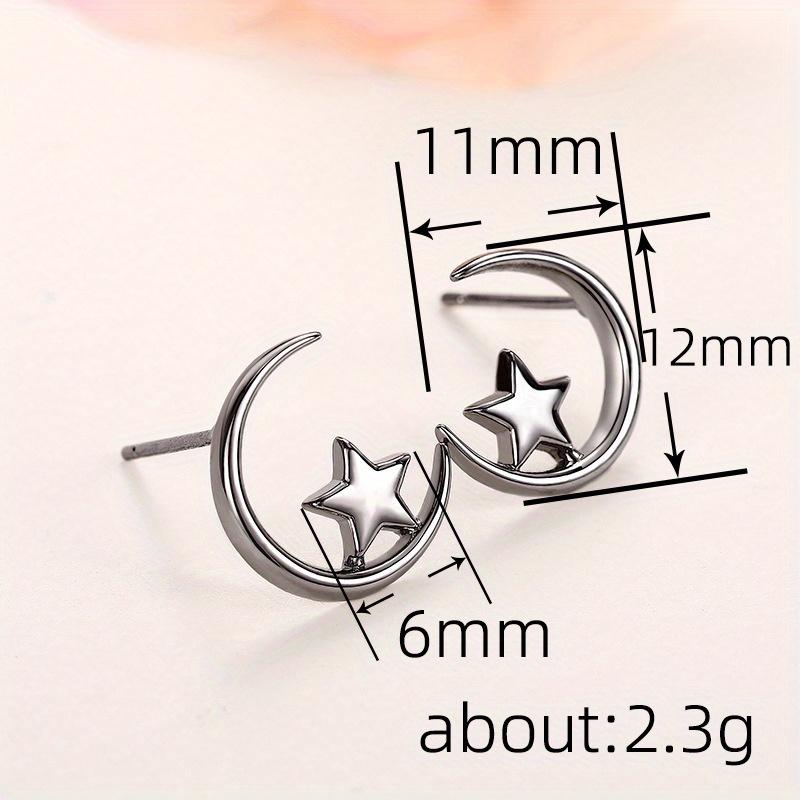A Pair of Star and Moon Student Earrings, In A Simple Style. Star and Moon Earrings with The Same Luster Are Suitable for Daily Wear