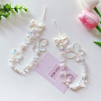 Cordón para teléfono móvil con forma de mariposa transparente, perla de imitación, lazo en forma de corazón y cuentas, antipérdida