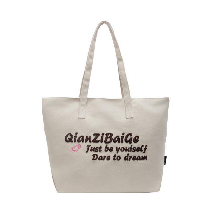 2024 autumn and winter new bag women's large-capacity handbag portable gift bag commute to school to work simple and fashionable