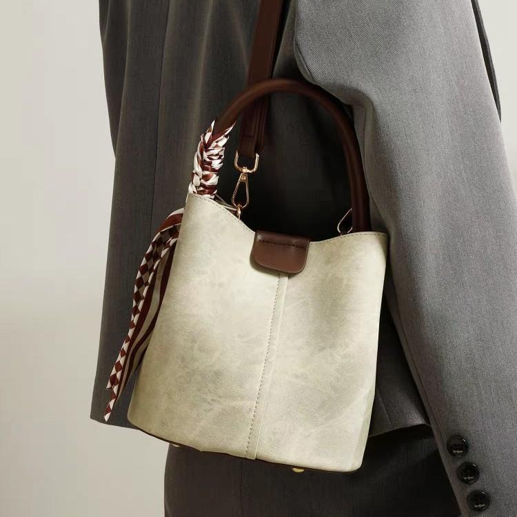 Simple Handheld Bucket Bag for Women's Spring New Fashionable Versatile Work Commuter Single Shoulder Crossbody Bag
