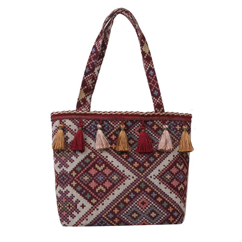 Large-capacity tote bag women's new fashion ethnic style student portable school bag foreign style fringed shoulder women's bag