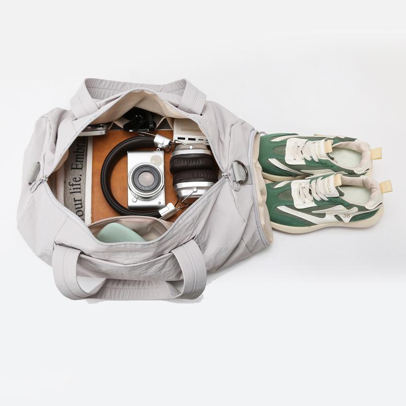 New large-capacity storage luggage bag, casual outdoor hand-held travel bag, multi-functional anti-splashing fitness yoga bag