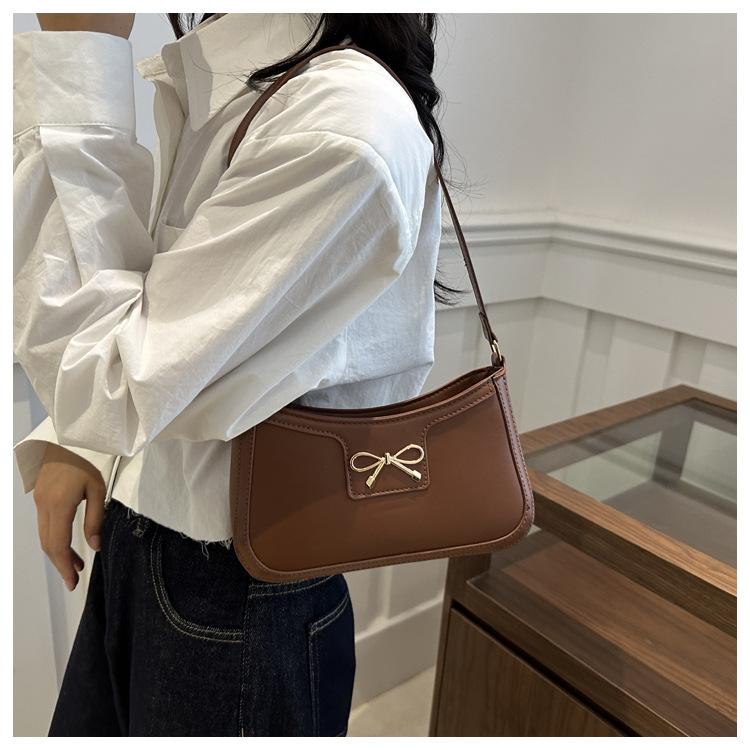 Fashion Bow Knot Faux Leather Armpit Bag Elegant Metal Decorated Shoulder Handbag for Women