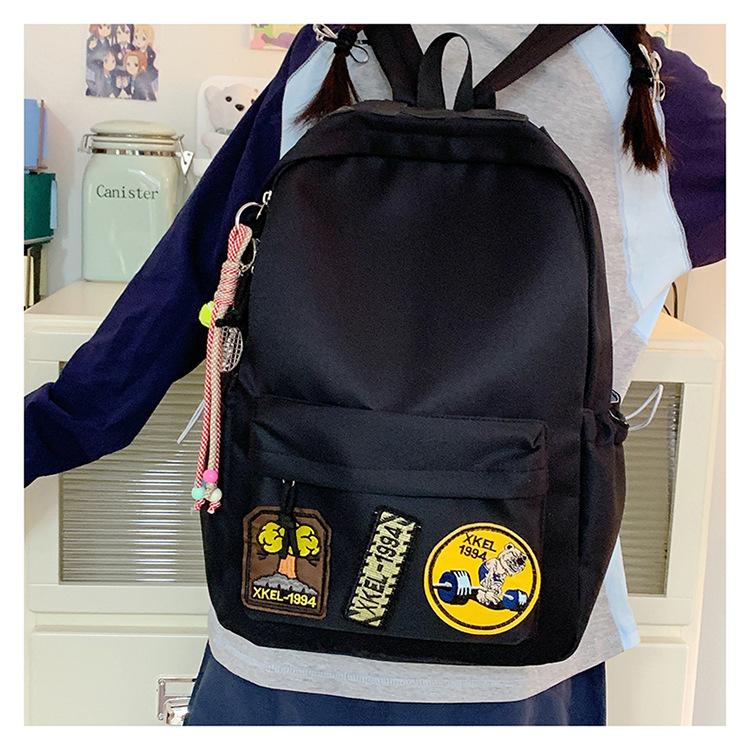 Schoolbag female Korean version ins style high value junior high school student high school student large capacity backpack 1011 new backpack male