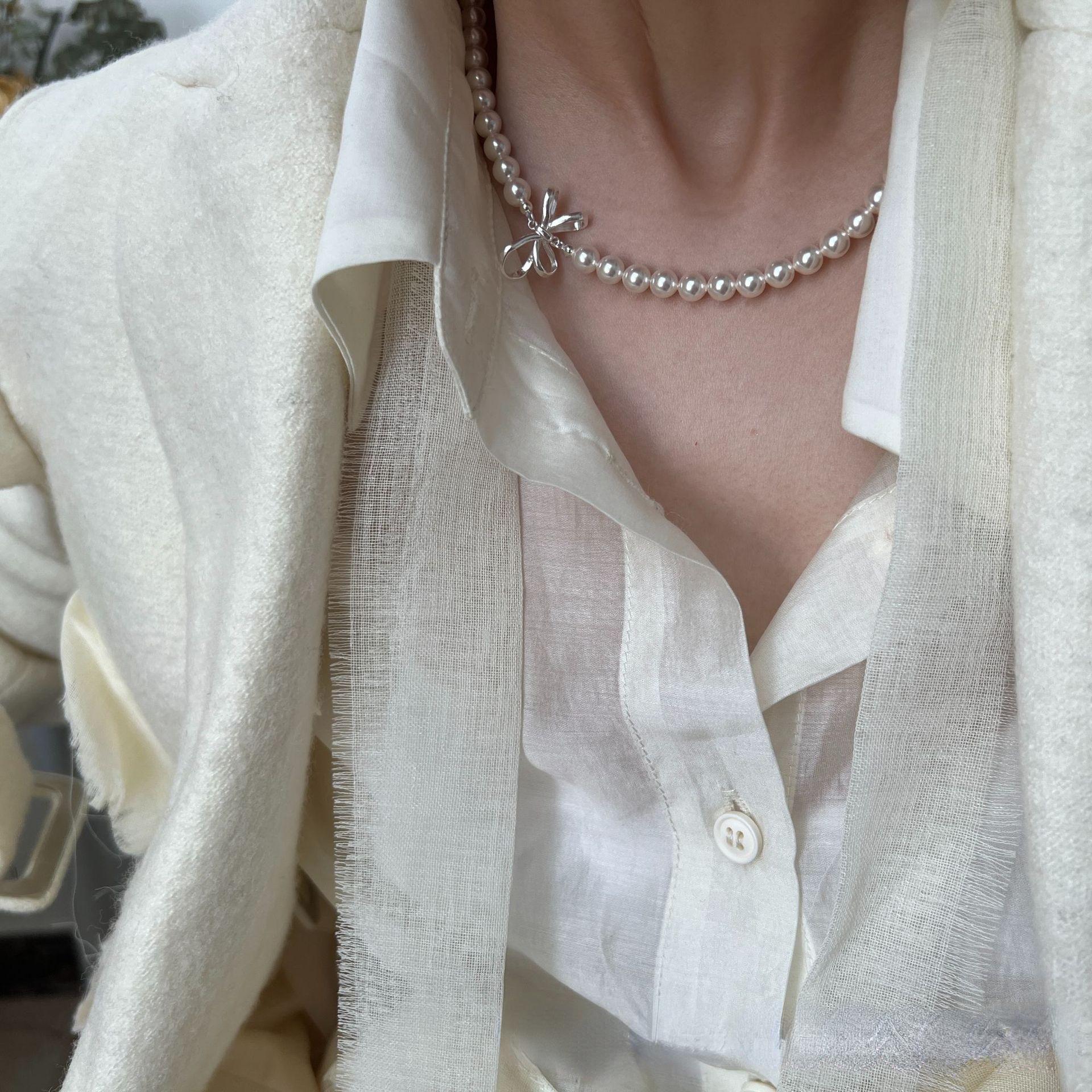 

Жемчужное колье с бантиком