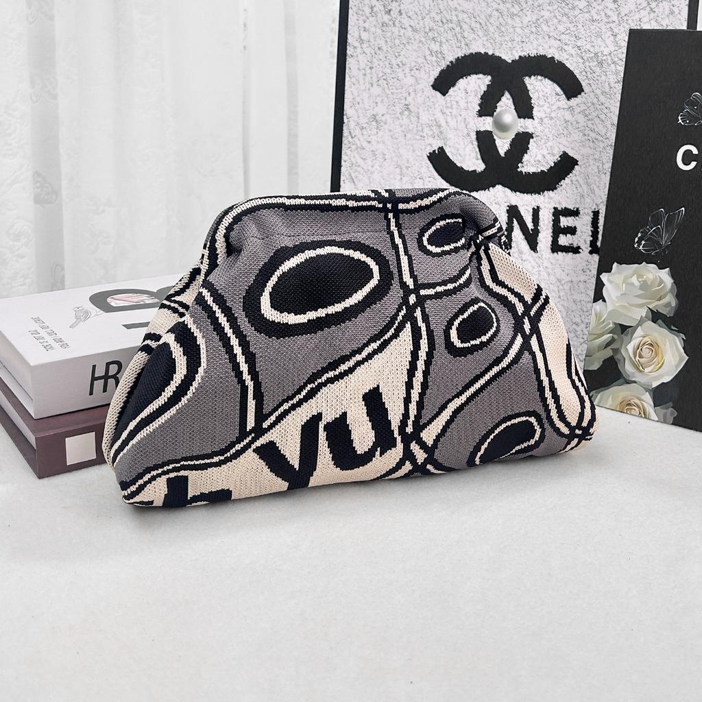 Knitted bag, striped clutch bag, women's flying woven clouds, versatile temperament, portable cosmetic bag, large capacity