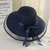 Wide Brim Bucket Hat with Elegant Black Bow - Breathable, Inelastic, and UPF Protective - Perfect for Beach, Travel, and Holiday Outings