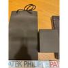 Used Patek Philippe collection book, 2 magazines, and travel case