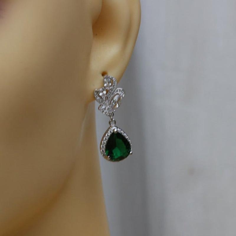 Cao Shi Exquisite AAA Teardrop Zircon Earrings: European & American Fashion Pear-Shaped Women's Earrings.