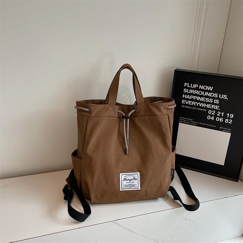 Niche casual simple personality fashion large capacity backpack autumn new women's texture backpack
