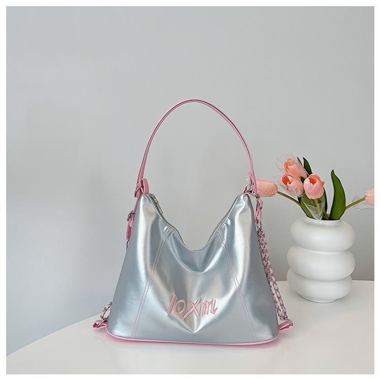 

2025 осень новый вышитые буквы большая вместимость многофункциональный рюкзак одноплечевая кроссбоди подмышечная сумка женщины серебряный