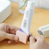 1PC Lazy Toothpaste Squeezer Face Wash Roller Presses The Magic Squeezer Toothpaste Clip