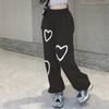 Locker sitzende koreanische Sporthose mit hoher Taille für Damen mit lässigem und lässigem Design und Herzmuster