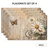 A Set of Four Decorative Placemats Featuring a Brown Butterfly Resting On White Daisy Vines And Flowers