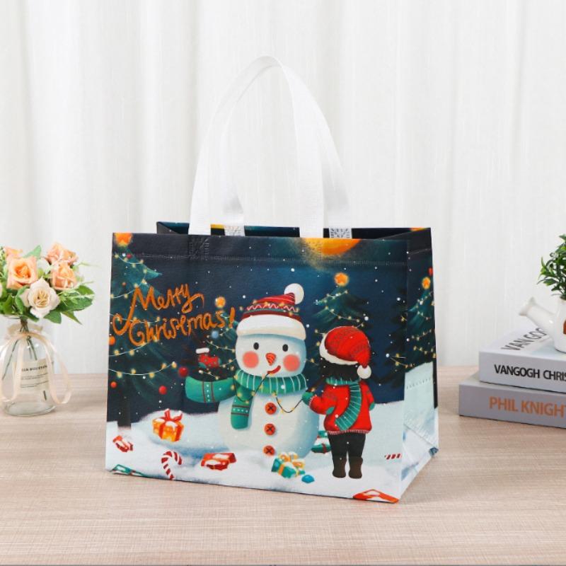 Borsa regalo di Natale Borsa per imballaggio regalo di caramelle in tessuto non tessuto di grande capacità con pupazzo di neve e design di Babbo Natale