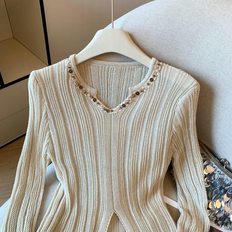 V-neck design sense long-sleeved knitted sweater women's early autumn new slim-fit split top