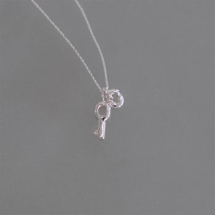 key + hole necklace