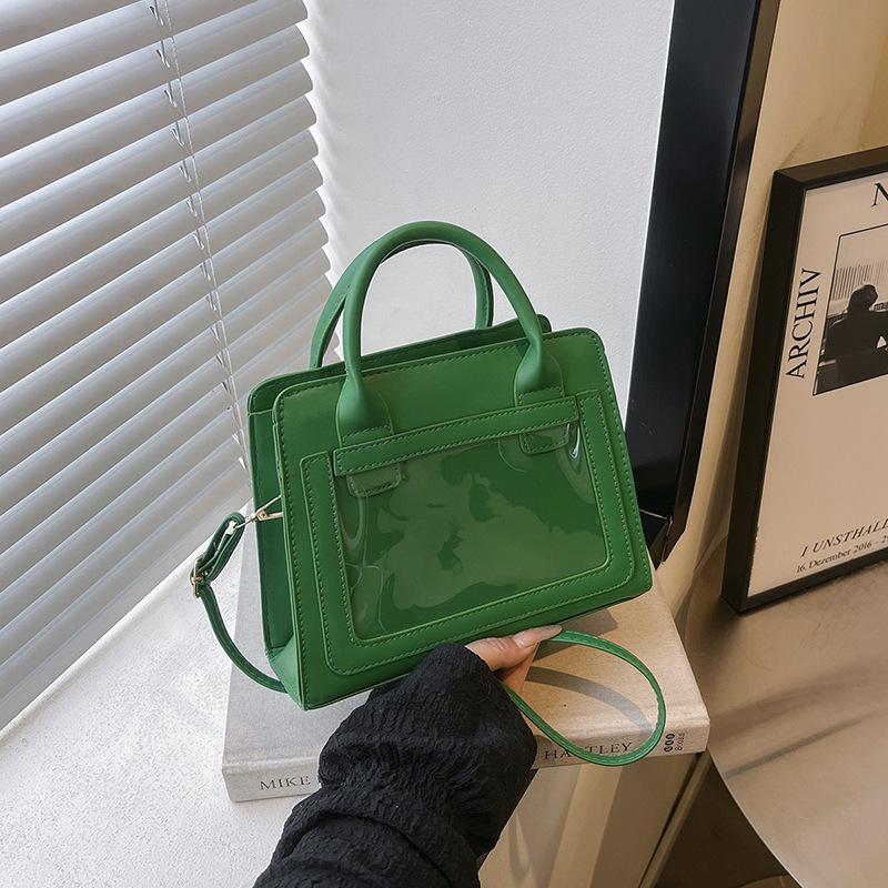 

Весна-лето 2025 новая нишевая дизайнерская сумка-мессенджер высокая ценность простая в иностранном стиле однотонная прозрачная маленькая квадратная сумка зелёный