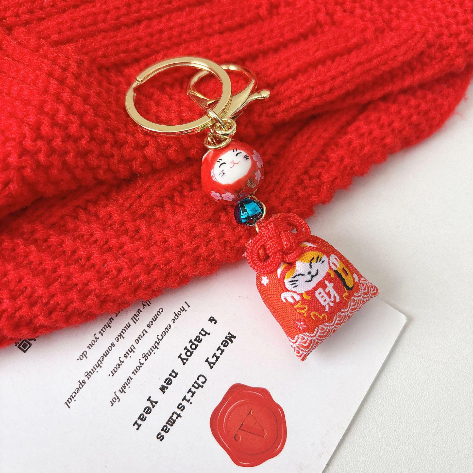 Golden Jade Beckoning Cat Omamori Charm: Pink Ceramic Keychain Pendant Blessing Gift