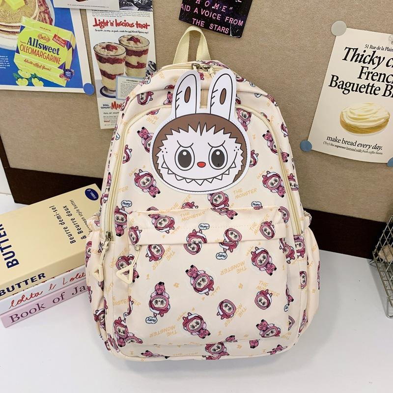 

Elementary school bag fashion cartoon printed backpack bag light weight to go out to play large capacity backpack fashion бежевий