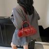 New niche high-end sense simple solid color personality versatile fashion portable messenger women's bag