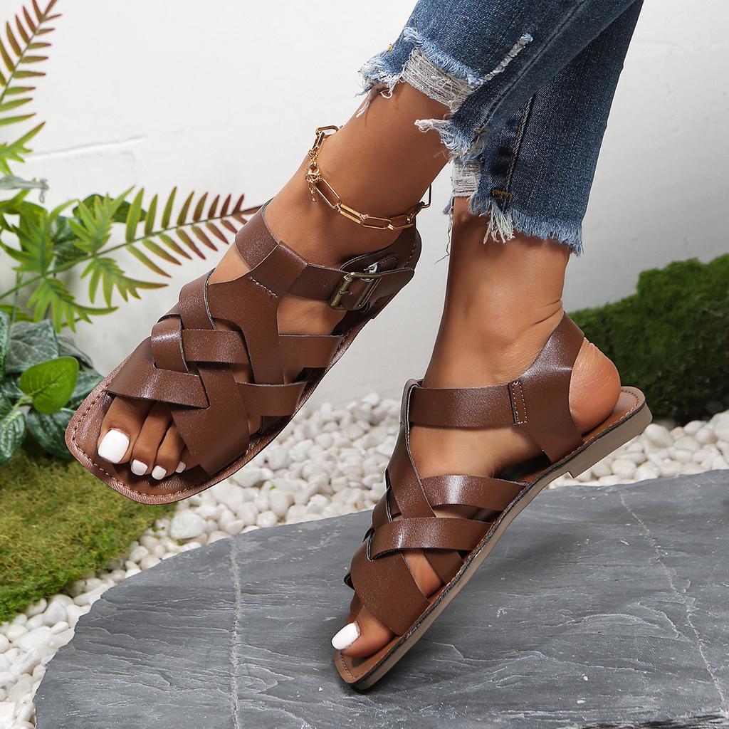 Retro style hand-woven flat-soled sandals women's 2025 summer outer wear new hollowed-out T-buckle Roman sandals