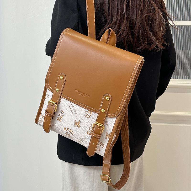 Cartoon printed backpack women's  new fashion large-capacity briefcase niche high-end textured women's bag