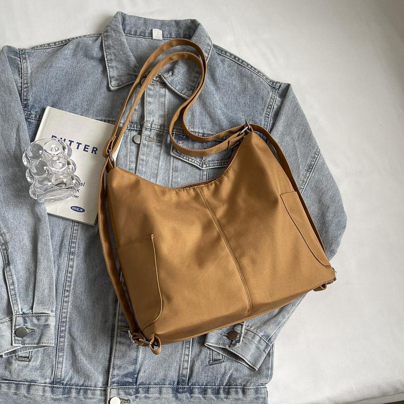 Einfarbige Tragetasche Damen-Schultertasche Große Kapazität Reise-Rucksack Umhängetasche