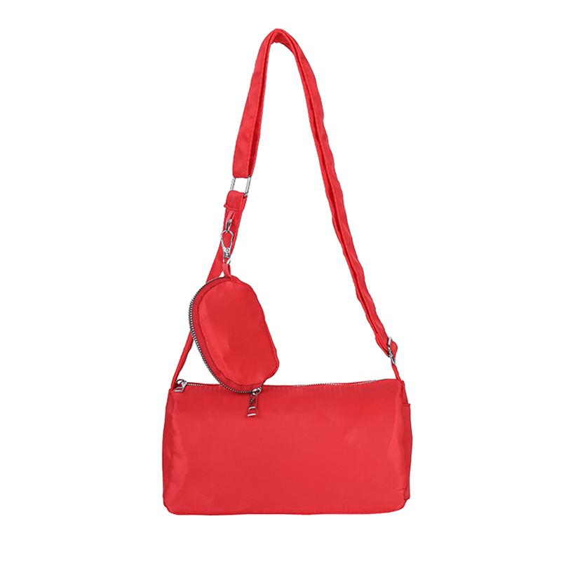 Leichte einfarbige Nylon-Zylinder-Umhängetasche Heißer Verkauf Trendige minimalistische Handtasche Lässig mit passender Münz-Crossbody-Tasche