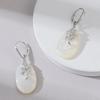 Exquisite Mother-of-Pearl Sterling Silver Luxury Earrings with Unique Face-Inspired Design
