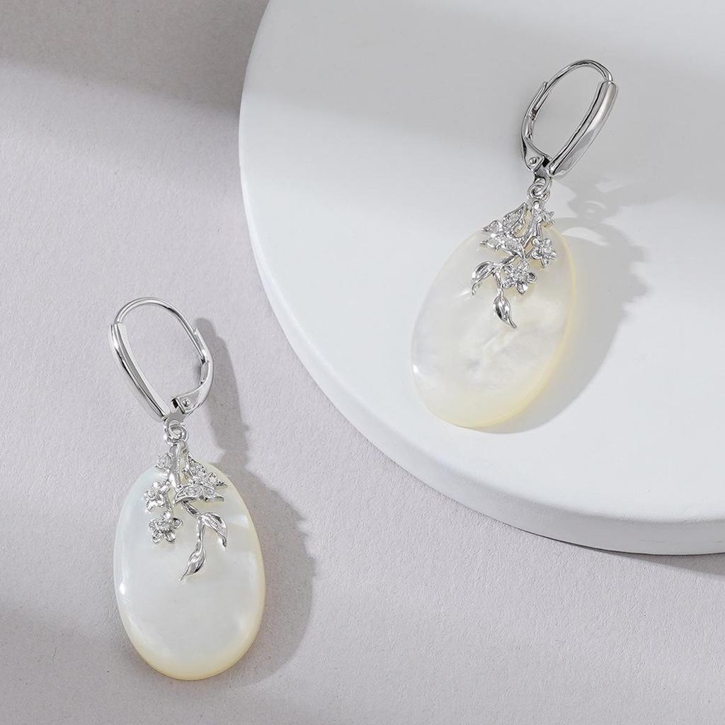 Exquisite Mother-of-Pearl Sterling Silver Luxury Earrings with Unique Face-Inspired Design