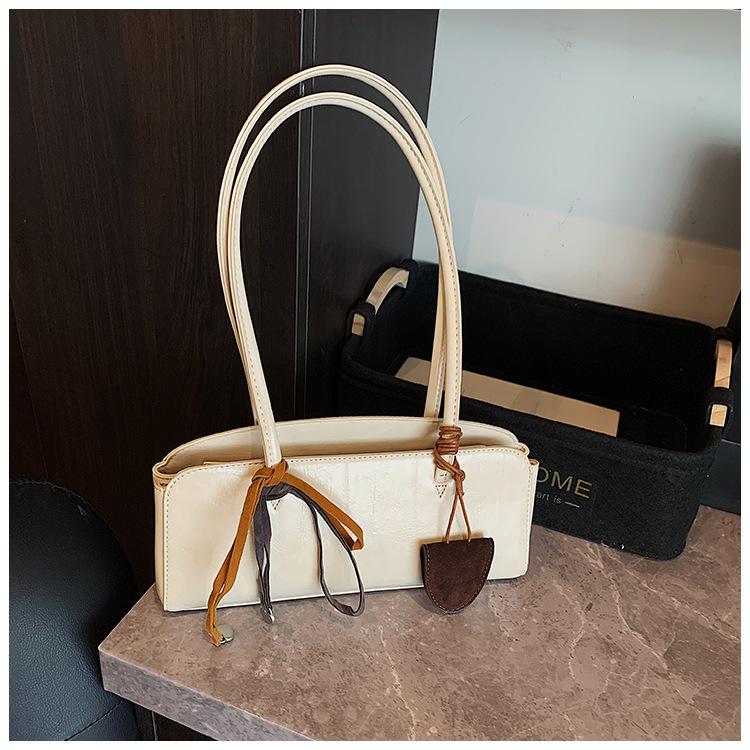 

Нишевая минималистичная сумка-багет под мышкой, женская, 2025 весна, ретро-темпераментная, универсальная, высококлассная сумочка