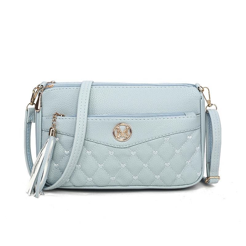 Autumn and winter new women's messenger bag fashionable versatile mobile phone bag large capacity fringed women's bag tide