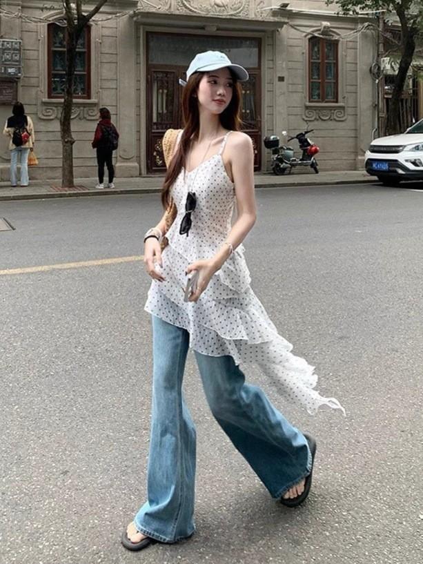 Korean Polka Dot Ruffle Leaf Edge Suspender Dress Women's Early Spring New Seaside Vacation Style Irregular Skirt Tide