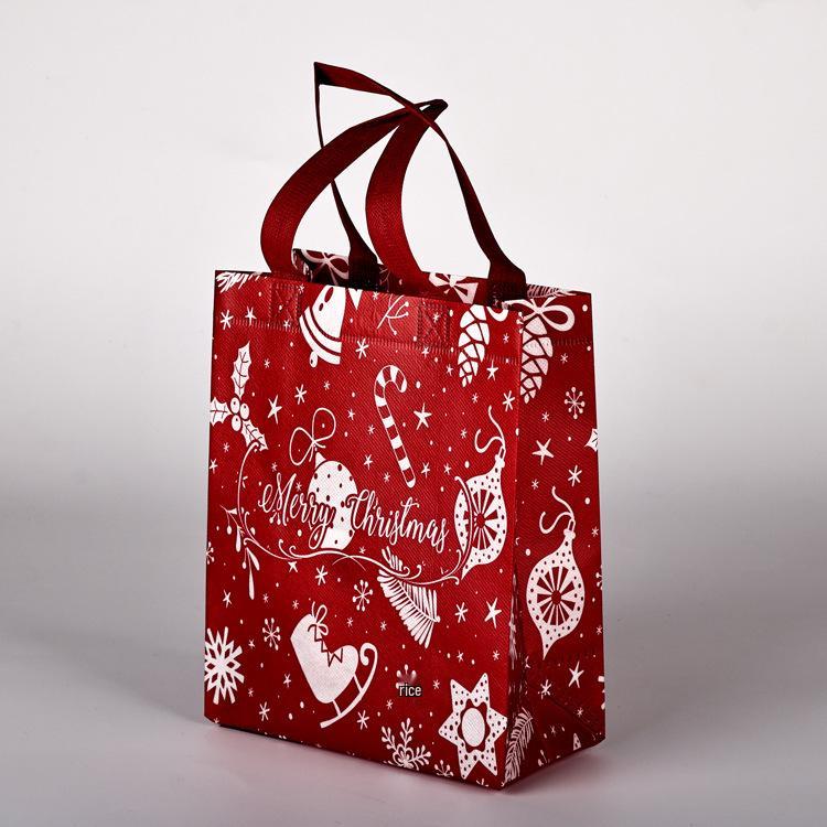 

В наличии Большая мультяшная рождественская нетканая сумка-тоут 2024 - Праздничная подарочная сумка большой вместимости для покупок в канун Рождества Height 25 × Width 20 × Side 15