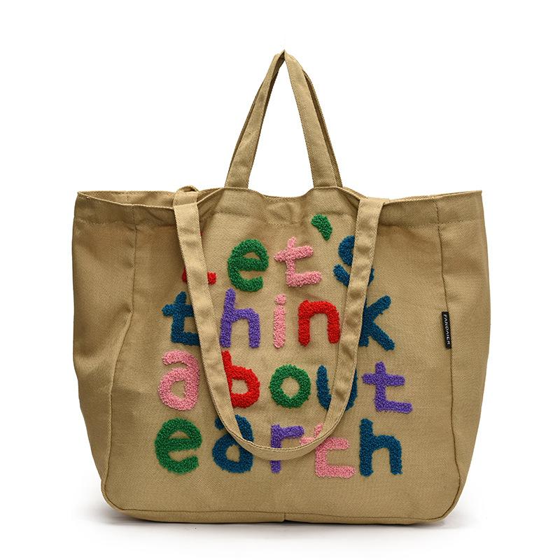 

2025 new high-value large-capacity commuter tote bag women s color letter trendy shoulder bag versatile underarm bag хаки