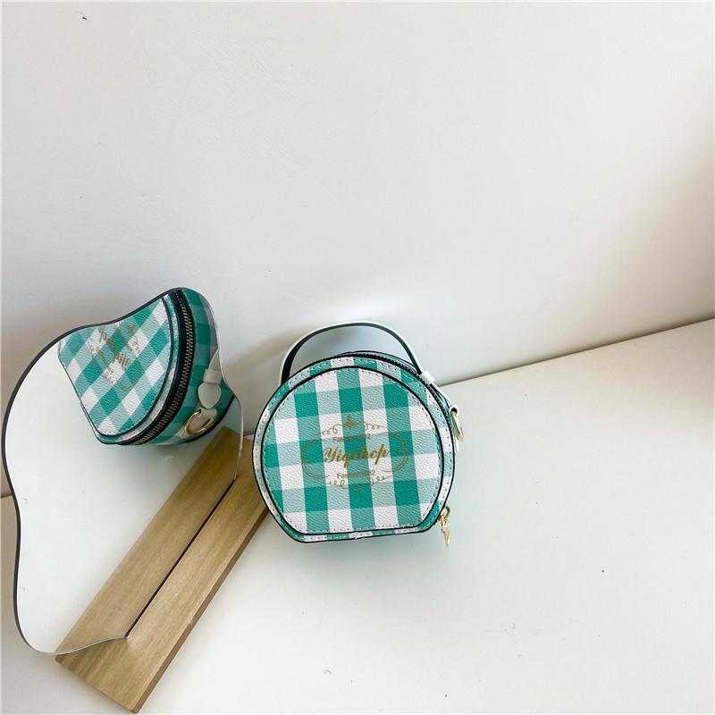 

Мини-сумка из искусственной кожи в стильном круглом дизайне для детей с застежкой-молнией для повседневного использования зелёный