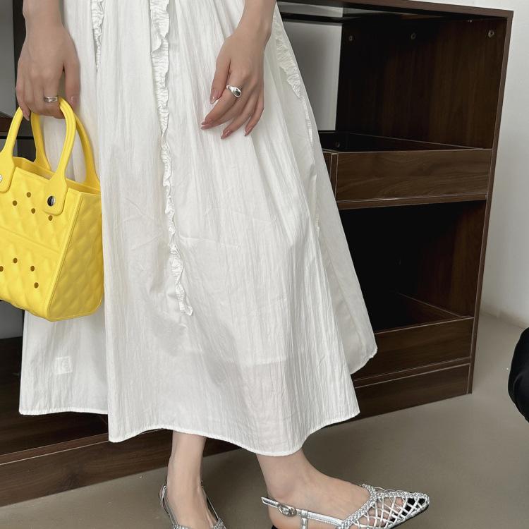 Korean Version of Niche Woven Breathable Sandals Women's 2025 New Holiday Style Flat Bottom Pointed Hollow Muller Sandals Outside Wear