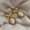 Retro Elegant Pearl Earrings Bow Queen Head Earrings Western Court Style Niche Exaggerated Stud Earrings