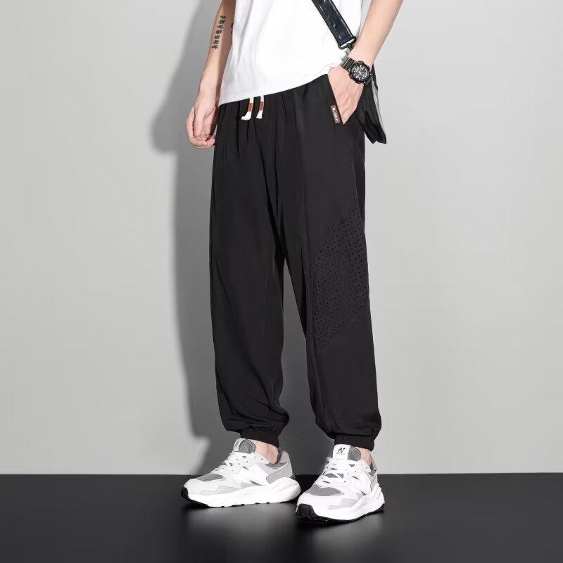 Pánské ležérní kalhoty letní tenké volné velké velikosti 2025 tepláky trendy rychleschnoucí sportovní devítibodové kalhoty ultratenké